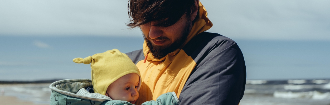 Adult holding a baby