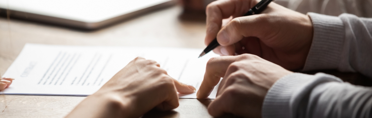 Person signing legal document